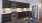 Spacious and well lit kitchen with wood flooring and stainless steel appliances