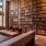 a room with a large bookcase and a couch
