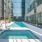 a swimming pool outside of a building