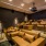 a large multimedia room with ample seating