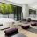 a room with a large rug and a large window