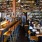 people sitting at tables in a restaurant
